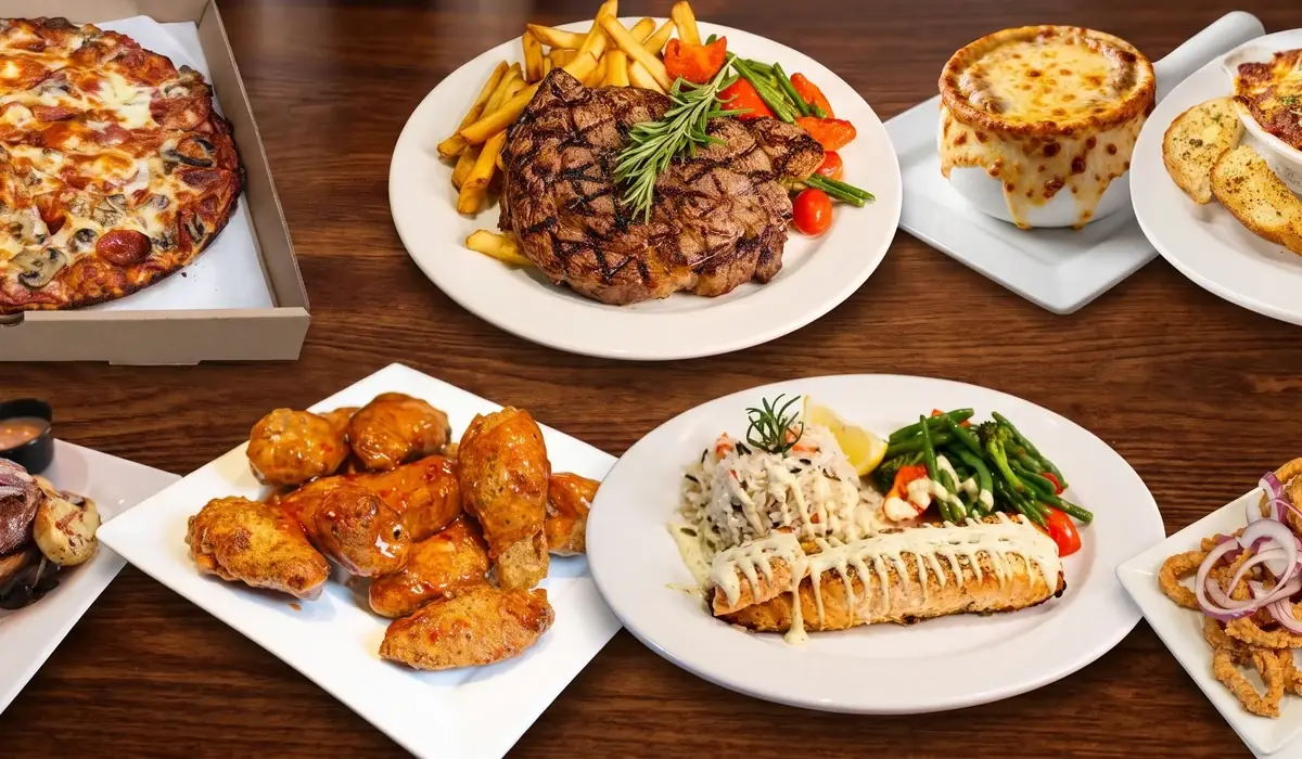 A table of D Jay's Restaurant steak, pizza and pasta favourites in Winnipeg